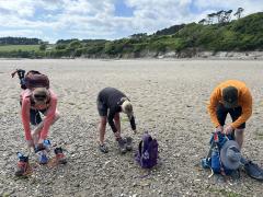 Getting our wading shoes on - might have been able to do this bare foot but we opted for the soft option!
